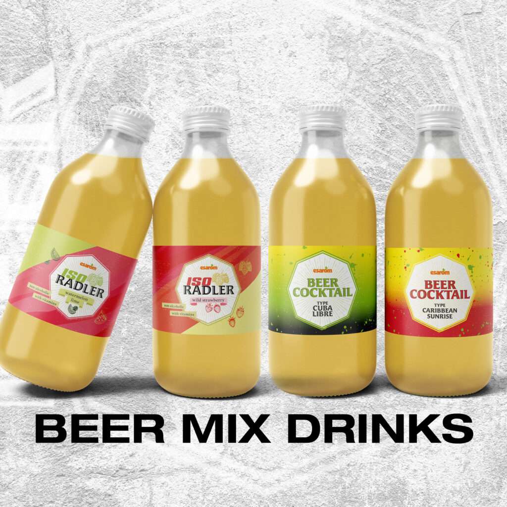 Four clear bottles filled with light golden liquid, each labeled with a different beer mix drink flavor from prosweets, stand in a row on a textured background. Bold black text below reads, “BEER MIX DRINKS.”.