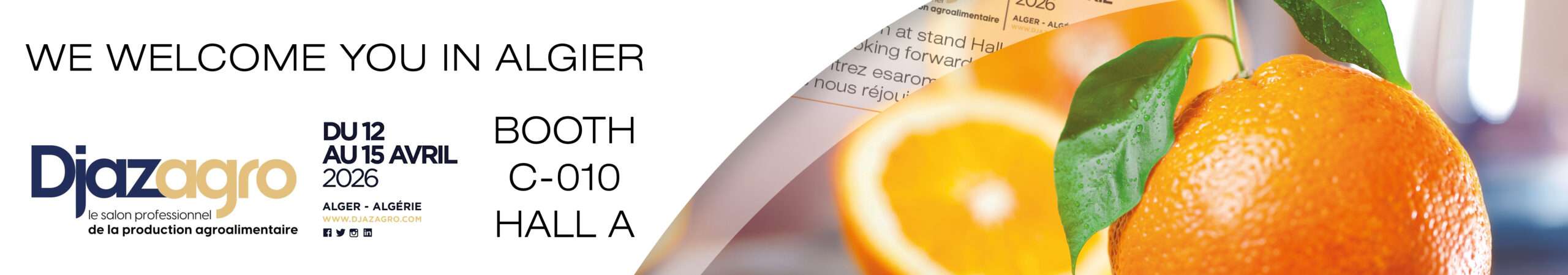 Banner for Djazagro food production trade show in Algiers, April 12–15, 2026, booth C 010, Hall A. The right side features a close up of a fresh orange with leaves and an orange slice, highlighting natural flavours and extracts.